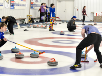 People curling at the Utica Curling Club in Whitesboro. Photo courtesy of Utica Curling Club.