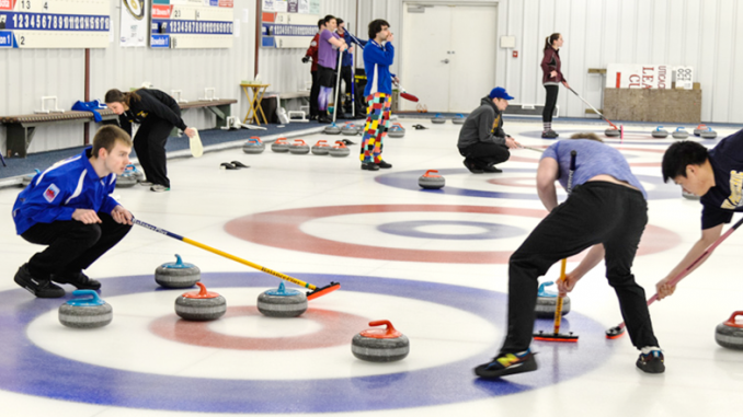 People curling at the Utica Curling Club in Whitesboro. Photo courtesy of Utica Curling Club.