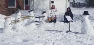 Aiden and Brandy Toen were one of the winners of a citywide snowman-building contest last year in Oswego. 